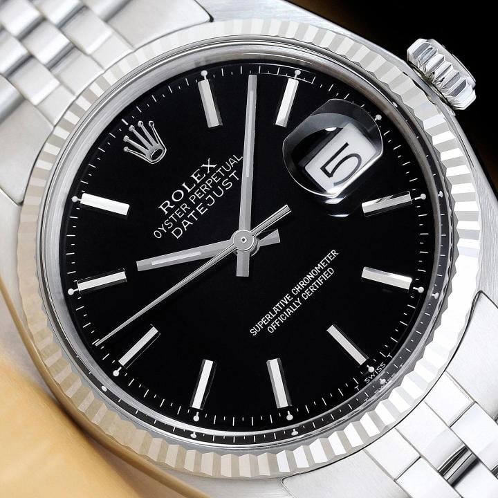 ROLEX MENS DATEJUST BLACK 18K WHITE GOLD STEEL WATCH w/ FOLDED JUBILEE BAND: This is an authentic Rolex Datejust 1601 watch with Rolex stick dial Ref., Rolex 18K white gold fluted bezel, and Rolex stainless steel folded jubilee bracelet. Descriptions: Brand: Rolex Model: Datej