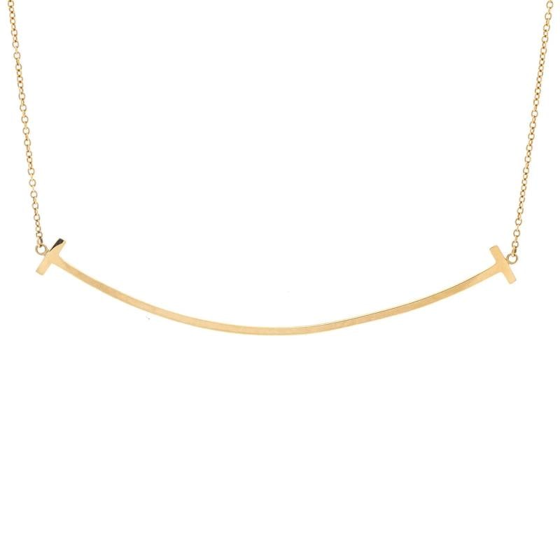 Tiffany & Co. T Smile Pendant Necklace 18K Yellow Gold Large: Measurements: Length: 16.0 - 18.0 ", Pendant Length: 5.8 mm, Pendant Width: 68.95 mm . Condition: Pre-owned - Good,Brand: Tiffany & Co.,Main Stone: Unknown,Metal: 18K Yellow Gold,Metal Purity: