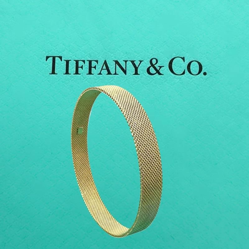 Tiffany & Co Somerset Mesh 18k Yellow Gold Bangle: Size: 8 Inches - 9 mm Width . Condition: Pre-owned - Excellent,Materials sourced from: United States,Country of Origin: Italy,Antique: No,Main Stone Creation: Natural,Signed: Yes,Color: Yellow,Cut Gra