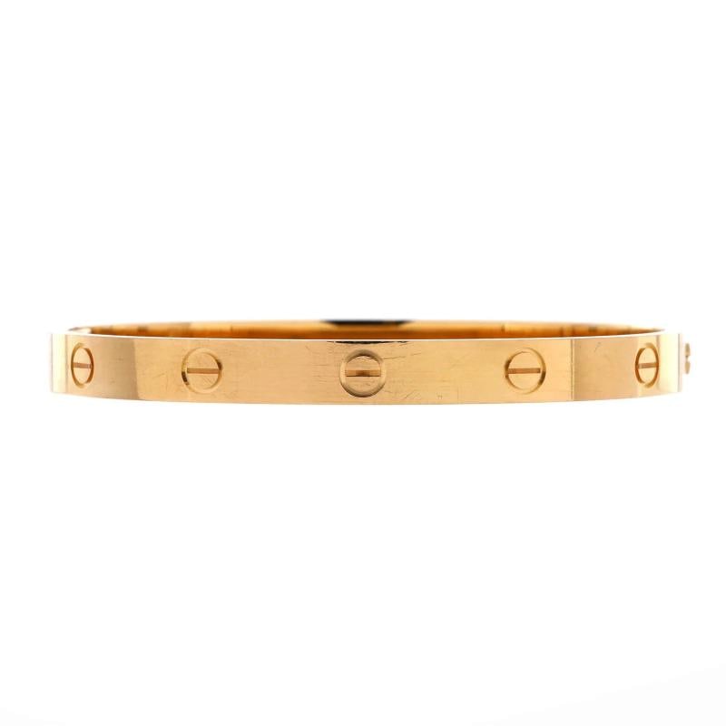 Cartier Love Bracelet 18K Yellow Gold: Measurements: Circumference: 6.5 ", Width: 6 mm . Condition: Pre-owned - Good,Brand: Cartier,Main Stone: Unknown,Metal: 18K Yellow Gold,Metal Purity: 18k,Style: Bracelet,Type: Bracelet,Color: Yellow G