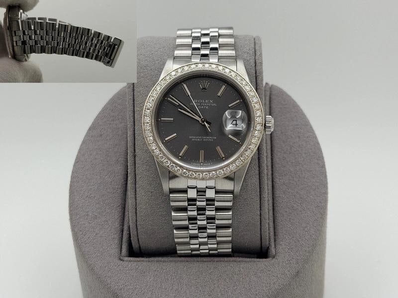 Rolex Date 15210 34mm Gray Dial Diamond Bezel Stainless Steel Jubilee: Style Number: 15210 Serial: X74**** Year: 1991 Model: Rolex Date Case Material: Stainless Steel Band: Stainless Steel Jubilee Bezel: Custom Diamond Bezel Dial: Gray Crystal: Sapphire Case Size: 34mm