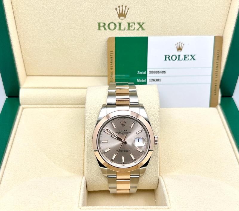 Rolex Datejust 41 126301 Sundust Dial 18K Rose Gold Stainless Steel Box Paper: Style Number: 126301 Year: 2019 Model: Rolex Datejust 41 Case Material: Stainless Steel Band: 18K Rose Gold & Stainless Steel Bezel: 18K Rose Gold Dial: Sundust Pink Crystal: Sapphire Crystal Case