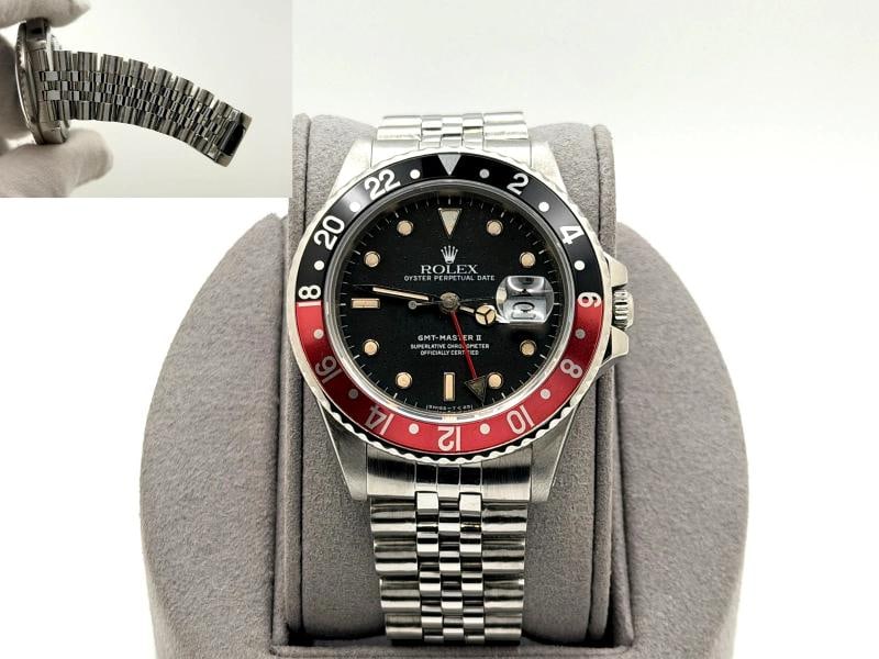 Rolex GMT Master II Fat Lady Coke 16760 40mm Black Dial Red Black Bezel Steel: Style Number: 16760 Serial: 9846*** Year: 1987 Model: Rolex GMT Master II 'Fat Lady' Case Material: Stainless Steel Band: Stainless Steel Bezel: Coke - Black & Red Dial: Black Crystal: Sapphire Case S