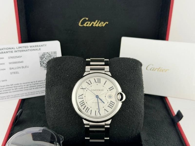 Cartier Ballon Bleu WSBB0049 42mm Silver Roman Dial Stainless Steel Box Paper: Style Number: WSBB0049 Serial: 3765254***** Year: 2020-Present Model: Cartier Ballon Blue De Cartier Case Material: Stainless Steel Band: Stainless Steel Bezel: Stainless Steel Dial: Silver Roman