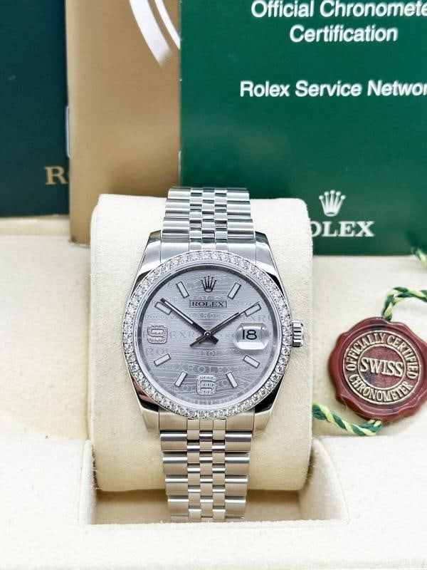 Rolex Datejust 116244 Rhodium Wave Dial Diamond Bezel Stainless Box Booklet: Style Number: 116244 Serial: 88J7X*** Year: 2010-Now Model: Rolex Datejust Case Material: Stainless Steel Band: Stainless Steel Bezel: Original Factory Diamond Bezel Dial: Original Factory Rhodium Wav