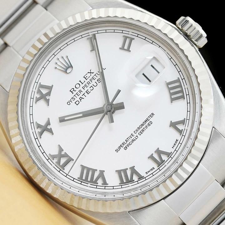 MENS ROLEX DATEJUST 16014 WHITE ROMAN DIAL 18K WHITE GOLD STAINLESS STEEL WATCH: Condition: Pre-owned - Excellent,Bezel Color: Silver,Max Wrist Size: 7.26-7.5 in,Number of Jewels: 27 Jewels,Indices: Roman Numerals, 12-Hour Dial,Bezel: Rolex 18K White Gold Fluted Bezel,Band/Strap: 