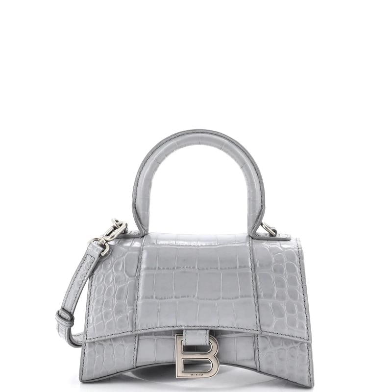 Balenciaga Hourglass Top Handle Bag Crocodile Embossed Leather XS: Accessories: Dust Bag, With Strap Measurements: Handle Drop 4", Height 5", Width 8", Depth 3", Strap Drop 9-23". Condition: Pre-owned - Excellent,Brand: Balenciaga,Exterior Material: Leather,Style: To