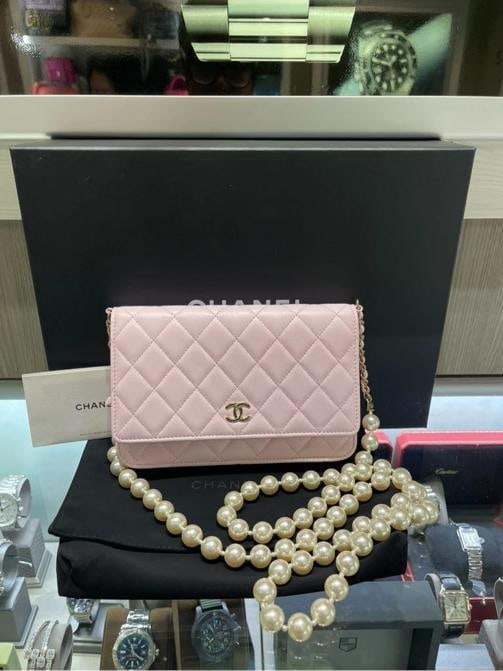Chanel Classic Quilted Pearl Wallet on Chain Baby Pink Lambskin (2022): Condition: Pre-owned - Excellent,Brand: CHANEL,Department: Women,Model: Chanel Classic,Exterior Color: Baby Pink,Style: Crossbody,Finish: Quilted,Exterior Material: lambskin leather,Accents: Pearl
