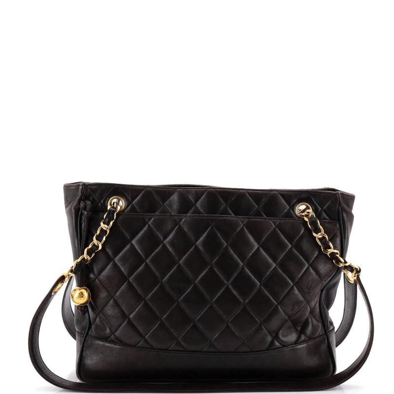Chanel Vintage Shopping Tote Quilted Lambskin Medium: Measurements: Handle Drop 14", Height 10", Width 12.5", Depth 3", Strap Drop 14" . Condition: Pre-owned - Good,Brand: Chanel,Exterior Material: Leather,Style: Totes,Exterior Color: Black,Department: W