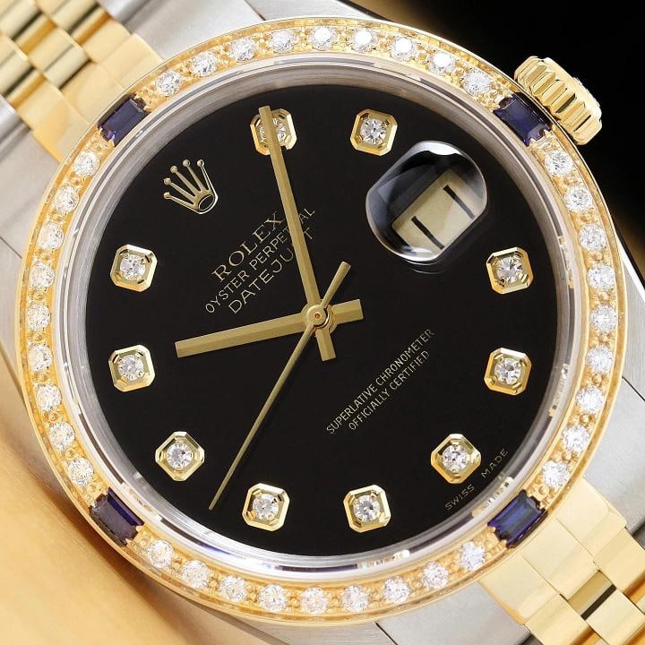 ROLEX DATEJUST 16233 BLACK FACTORY DIAMOND SAPPHIRE 18K GOLD STEEL WATCH: This is an authentic Rolex Datejust 16233 watch with two tone 18K yellow gold and stainless steel jubilee bracelet, factory Rolex diamond dial Ref., and custom 18K yellow gold sapphire diamond bezel.