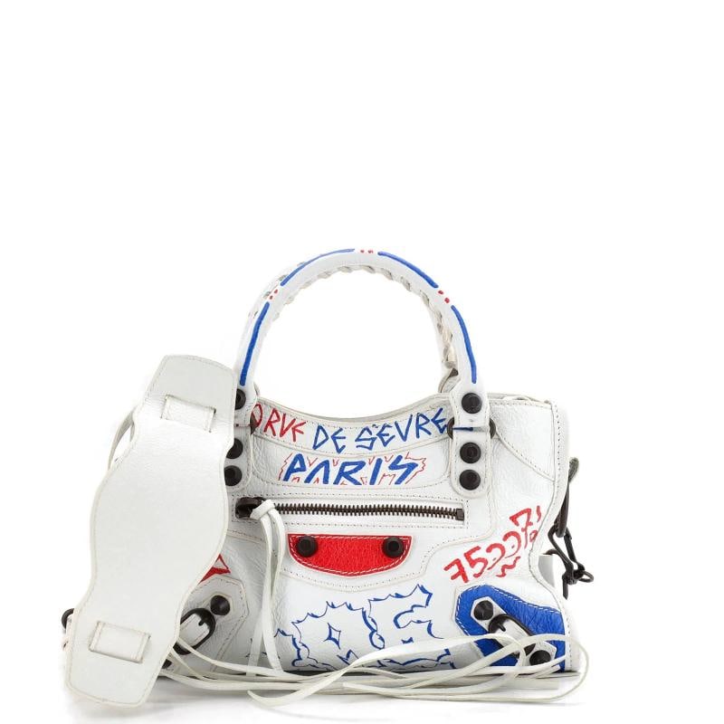 Balenciaga City Graffiti Classic Studs Bag Leather Mini: Condition: Pre-owned - Good,Brand: Balenciaga,Exterior Material: Leather,Style: Satchels,Exterior Color: White,Department: Women,Size: Mini,Accessories: Mirror, With Strap Condition: Good. Exterior: