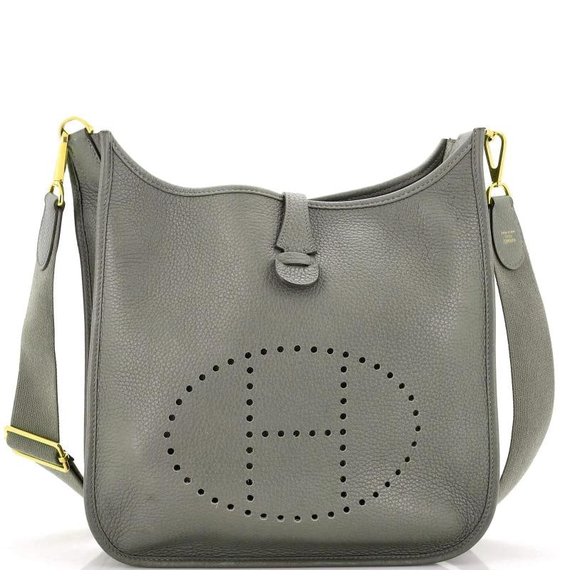 Hermes Evelyne Bag Gen II Clemence GM: Condition: Pre-owned - Good,Brand: Hermes,Exterior Material: Leather,Style: Cross Body Bags,Exterior Color: Gray,Department: Women,Size: Gm,Accessories: With Strap Condition: Very Good. Exterior: