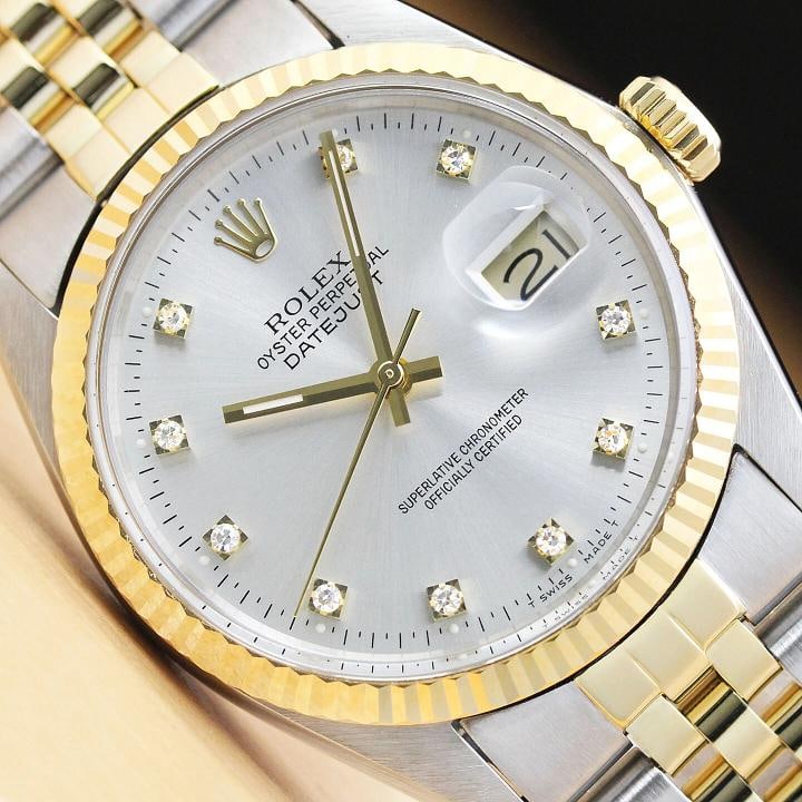 ROLEX MENS DATEJUST FACTORY DIAMOND 18K YELLOW GOLD STAINLESS STEEL SILVER WATCH: This is an authentic Rolex Datejust 16013 watch with Rolex 18K yellow gold and stainless steel jubilee bracelet, factory Rolex diamond dial Ref., and Rolex 18K yellow gold fluted bezel. Descriptions: