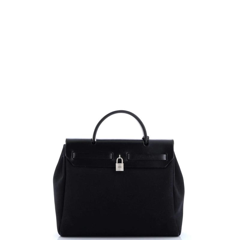 Hermes Herbag Toile and Leather PM: Condition: Pre-owned - Good,Brand: Hermes,Exterior Material: Leather, Canvas Plain,Style: Top Handle,Exterior Color: Black,Department: Women,Size: Pm,Accessories: Lock, Extra Bag, Keys, Clochette,