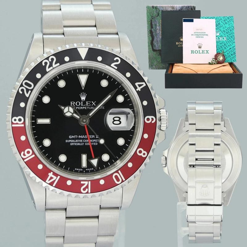 1997 PAPERS MINT Rolex 16710 GMT-Master II 3185 Coke Red Steel 40mm Watch Box: Case & Dial Case Material: Rolex Stainless Steel Case Size: 40mm Bezel: Rolex Red and Black Coke Crystal: Rolex Sapphire Dial: Rolex Black Stick Movement & Bracelet Movement: Rolex Automatic Bracelet
