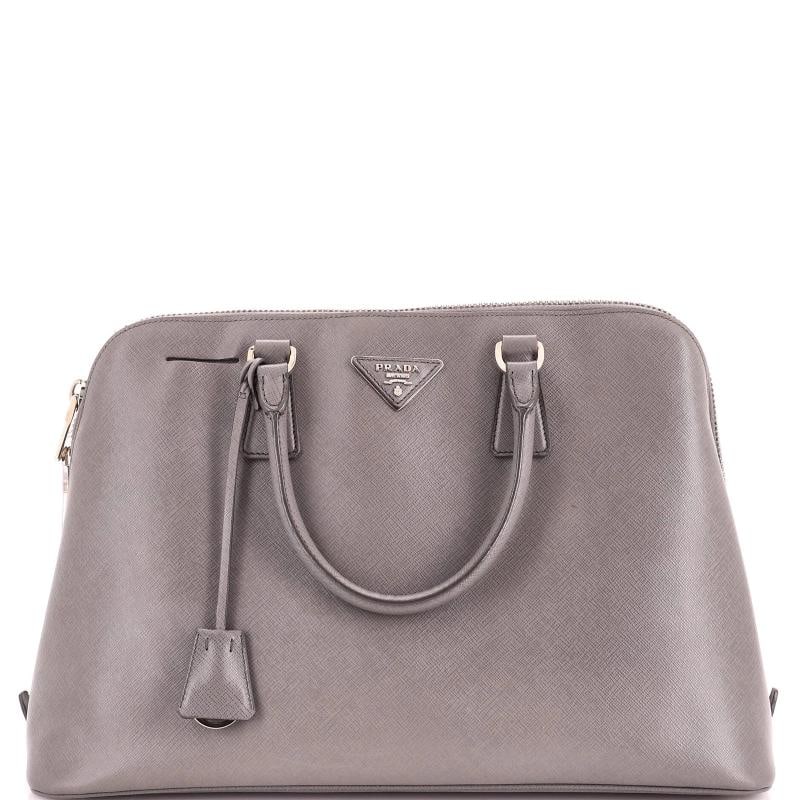 Prada Promenade Bag Saffiano Leather Large: Accessories: Clochette Measurements: Handle Drop 4.5", Height 10", Width 14.5", Depth 6", Strap Drop 20-23". Condition: Pre-owned - Good,Brand: PRADA,Exterior Material: Leather,Style: Bowler,Exterior