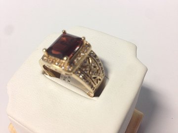 Ladies Vintage Style Diamond & Red stone 14K Ring: This beautiful ring is made of solid 14k gold and weighs 7.5g. There are a total of 58 genuine diamonds for a total of .5ctw. The Center Stone is a beautiful red color, and appears to be a garnet, alt