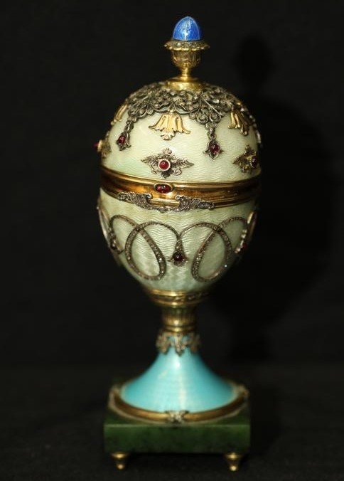 Michael Perchin Faberge egg with Easter egg finial: Michael Perchin (1860-1897) Faberge egg with Easter egg finial, diamonds and precious stones placed throughout possibly ruby. Interior of lid covered in velvet with removable vase with flowers and dia