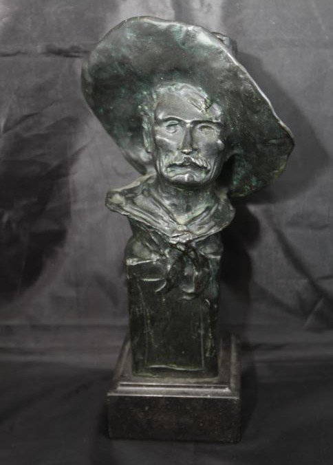 Signed Frederic Remington bust of a cowboy bronze: Signed Frederic Remington bust of a cowboy bronze sculpture stamped "Roman Bronze Works NY" marked "Copyright by Frederic Remington", 12.5"T.