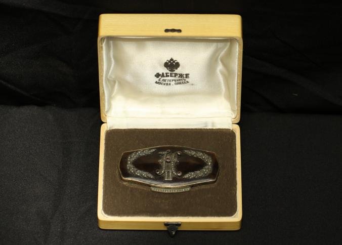 Henrick Wigstrom tortoise shell case: Henrick Wigstrom (1862-1923) tortoise shell case designed by the Faberge head work master with diamond encrusted decoration marked on case "H.W" "88" measuring 3.5"L in original Faberge box. Wigstrom,