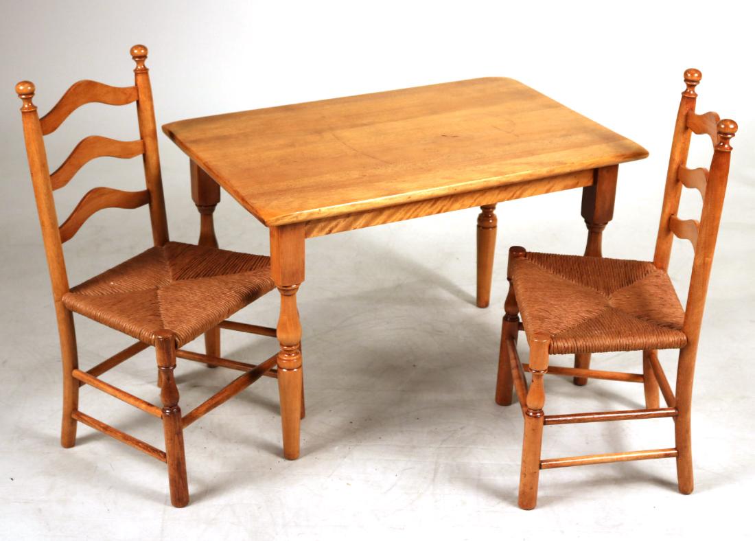 Child's Hardwood Table With Pair of Chairs: Ladder back chairs with rush seats. Table, 20"h x 30"w x 20"d, chair, 27"h to back of chair