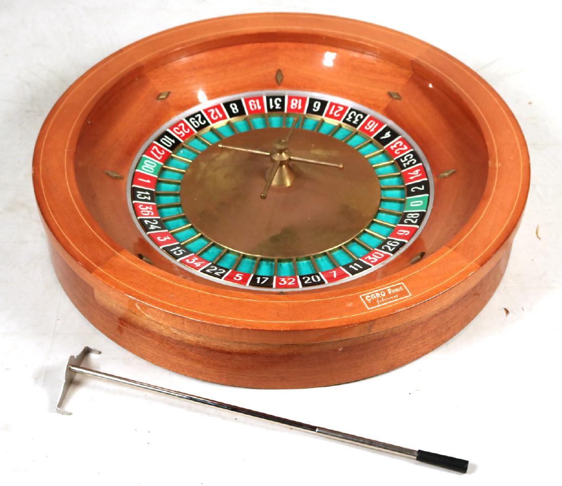 Mahogany and Bronze Casino Roulette Wheel: By "G. Caro, Paris." 5-1/2"h x 31"dia.