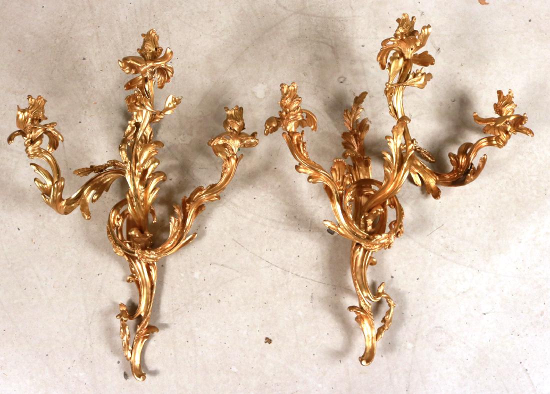 Pair of Louis XV Style Gilt-Bronze Wall Scones: French, 19th C., three-light, of impressive size. Apx. 30"h x 24-1/2"w x 9"d Property from a Park Ave and Southampton, New York Private Collection.