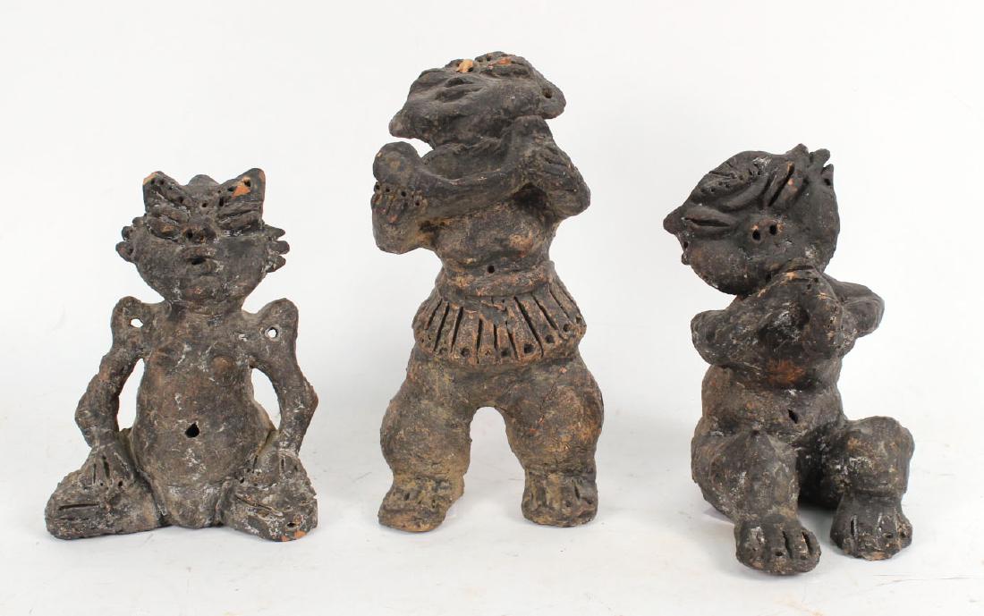 THREE EARTHENWARE FIGURALS (1 of 7)