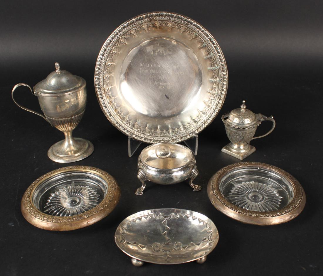 Group of Silver Table Objects: Including a pair of English Georgian Silver salt cellars, hallmarked, small footed oval dish, two covered handled jars, total weight approx. 9 T.O. Together with a Reed & Barton silver plated presenta