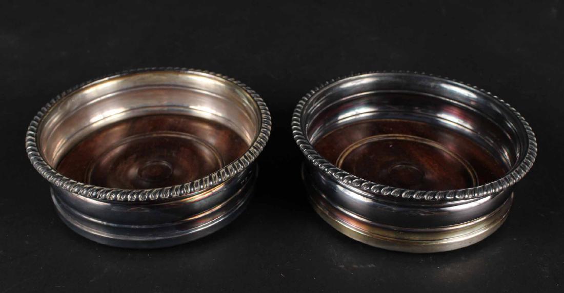 Two Silver Plated Wine Bottle Coasters: 5.5"dia.
