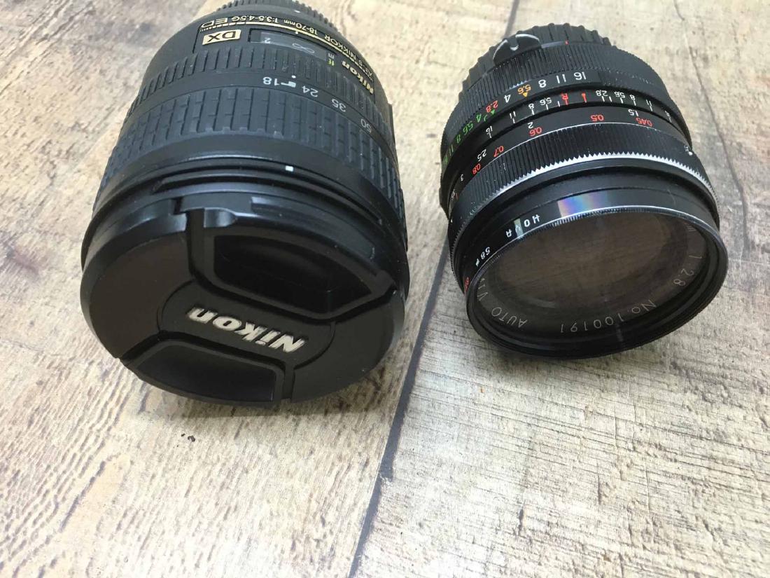 NIKON ASPHERICAL LENS AND VIVITAR WIDE ANGLE LENS: Nikon lens 18-70mm 1:3.5-4.5g and Vivitar wide angle .8.