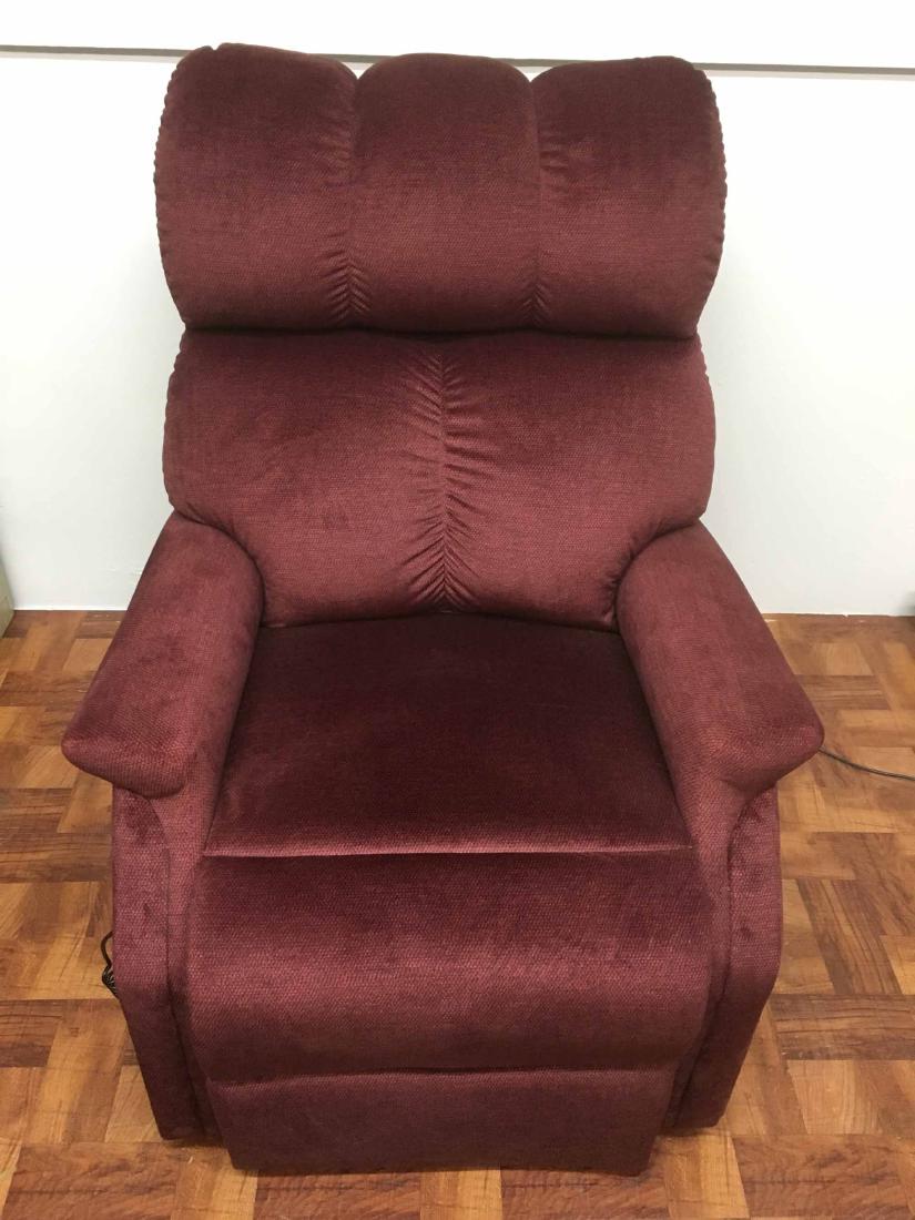 UPHOLSTERED RECLINING ARMCHAIR: By Pride. 45"h