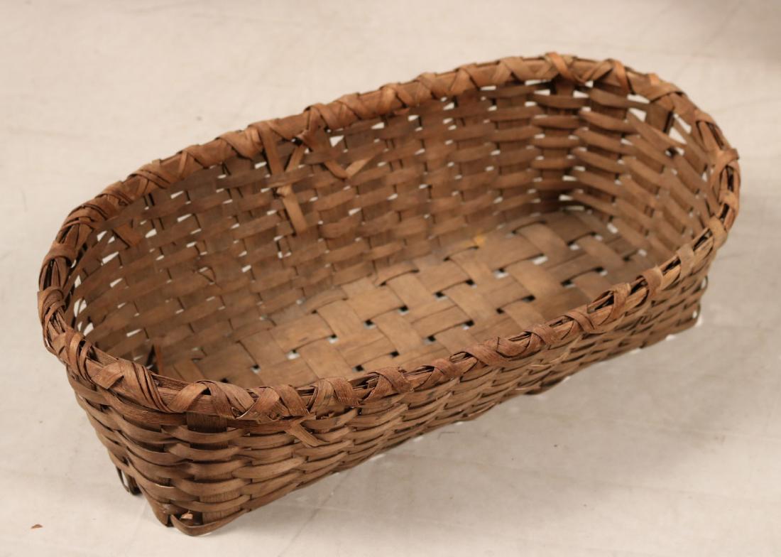 FOUR WOVEN BASKETS (1 of 5)
