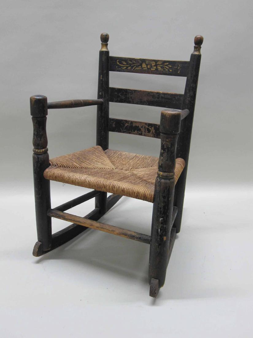 STENCIL DECORATED CHILD'S ROCKING ARM CHAIR: 24" tall