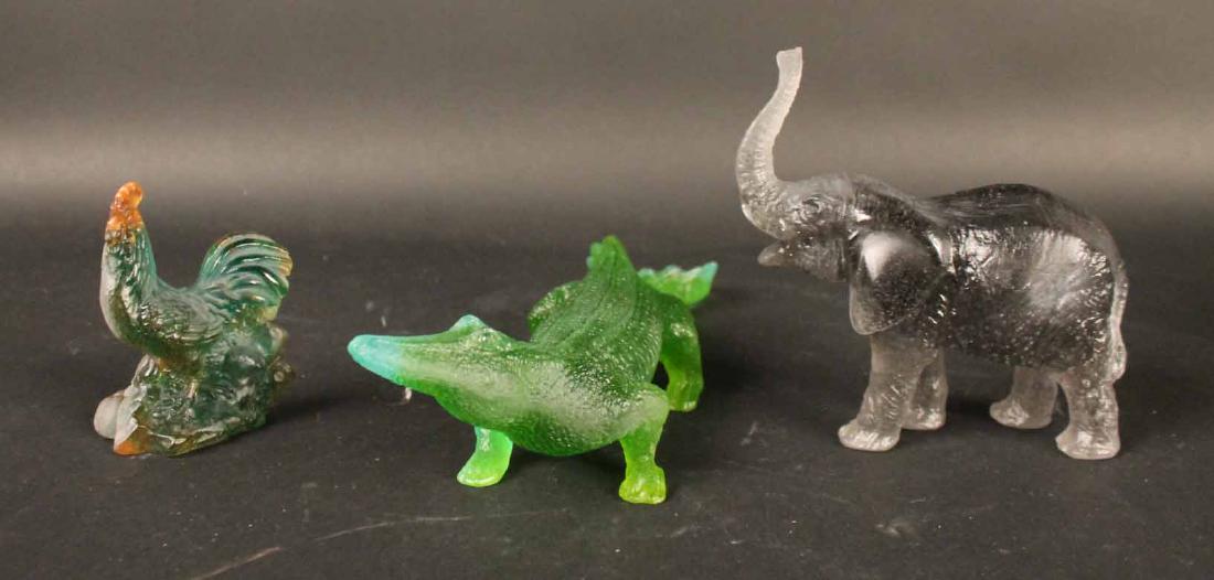 Three Daum Pate de Verre Animal Figures: Comprising, a green alligator, a multi-colored rooster, and a grey elephant, all signed Daum, France. Alligator: 12"l