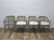 SET OF FOUR RATTAN ARMCHAIRS