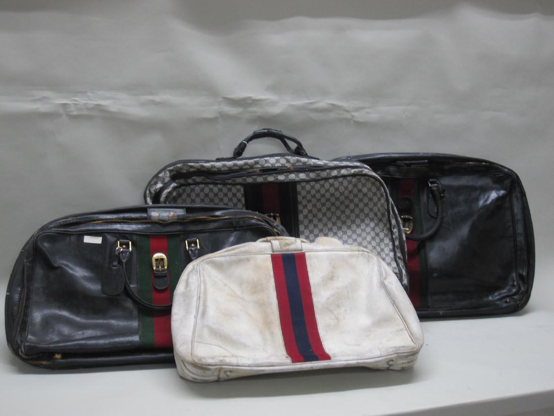 THREE VINTAGE GUCCI SUITCASES (1 of 8)