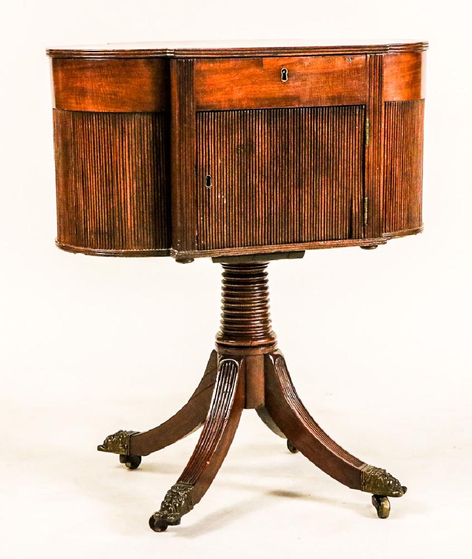 Federal Mahogany Sewing Table: On four saber legs. In the manner of Duncan Phyfe. 29"h x 24"w x 14"d Deaccessioned from a Virginia Museum. D17.10