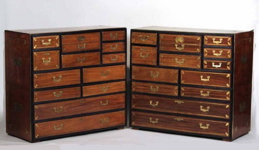 Pair of Regency Brass-Bound Campaign Chests: English, 19th, part-ebonized. 39-1/2"h x 43-1/2"w x 18"d. Property from the Collection of Phillips Hathaway, Ragamont House, Salisbury, CT.