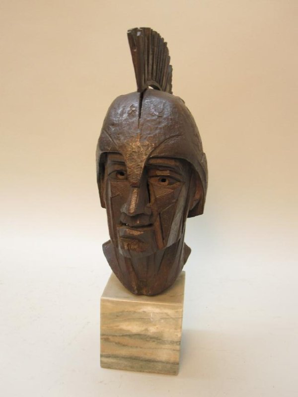 BRONZE BUST OF ROMAN SOLDIER: Mounted on a marble base. Overall size 16" tall x 8" x 5"