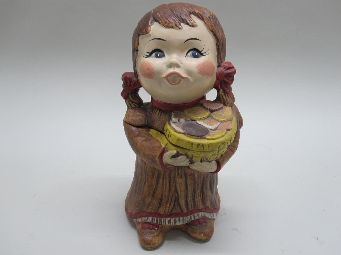 VINTAGE LITTLE GIRL HOLDING BASKET COOKIE JAR: 20th C.