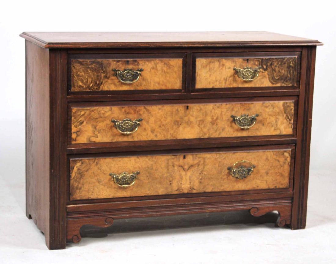 ENGLISH BURLWOOD CHEST OF DRAWERS: C. 1800, having two short drawers over two long drawers, each drawer fitted with locking mechanism, lacking keys, raised on scrolled bracket feet. 29-1/4"h x 42"w x 19-1/4"d