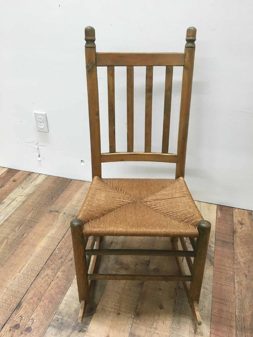 MAPLE RUSH SEAT CHILD'S ROCKING CHAIR: American, 19th C., traces of green paint. 34"h