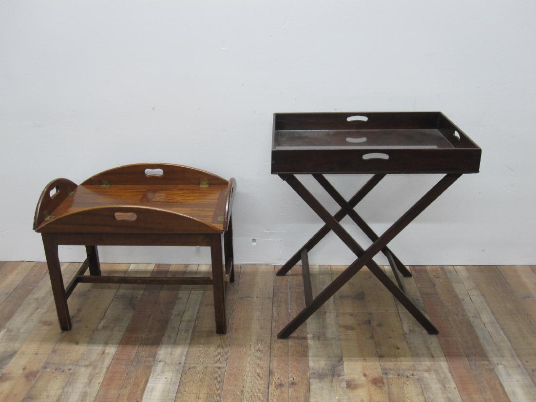 TWO BUTLER TRAY TABLES: One on a solid base the other on a collapsible stand.