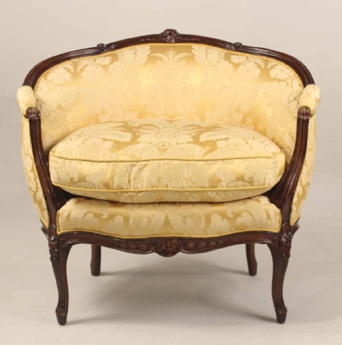 Louis XV Style Mahogany Bergere: 20th C., with yellow-upholstery. 33"h x 36"w, across arms.