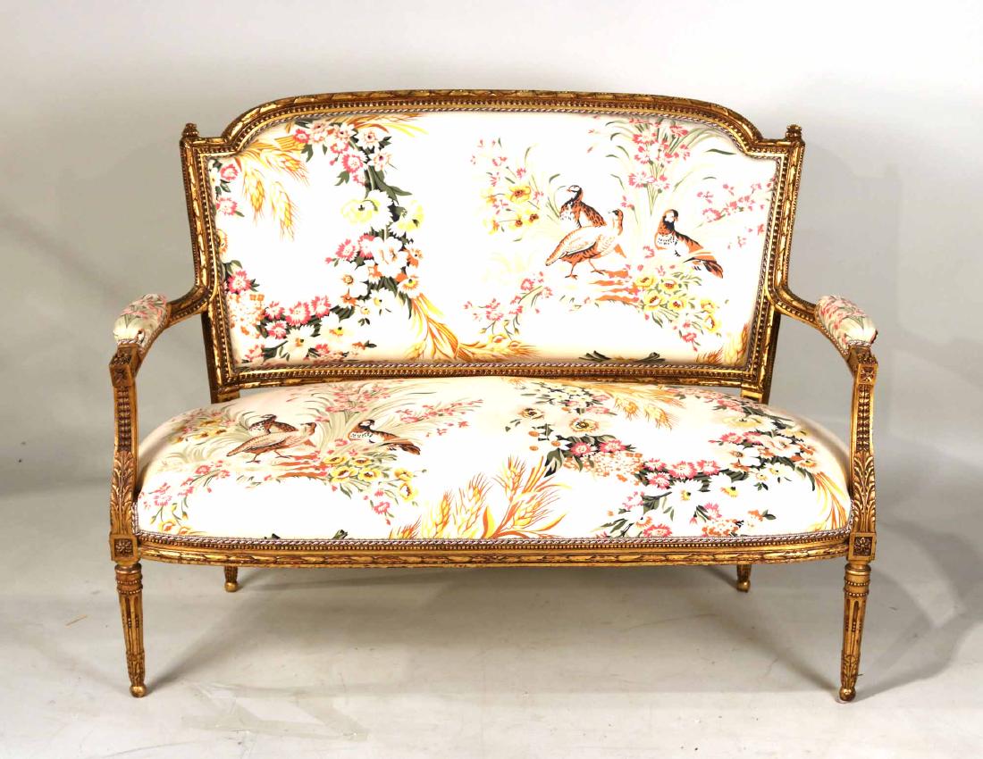 Louis XVI Style Giltwood Settee: 20th C., with floral and bird upholstery. 39-3/4"h x 4'6"w