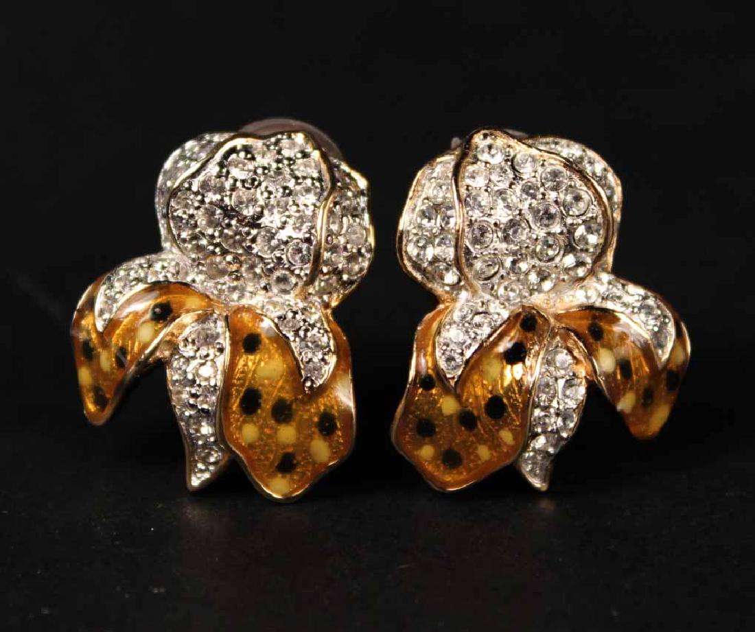 Pair of Judith Leiber Ear Clips: Enamel and pave crystal. Each 1"l.