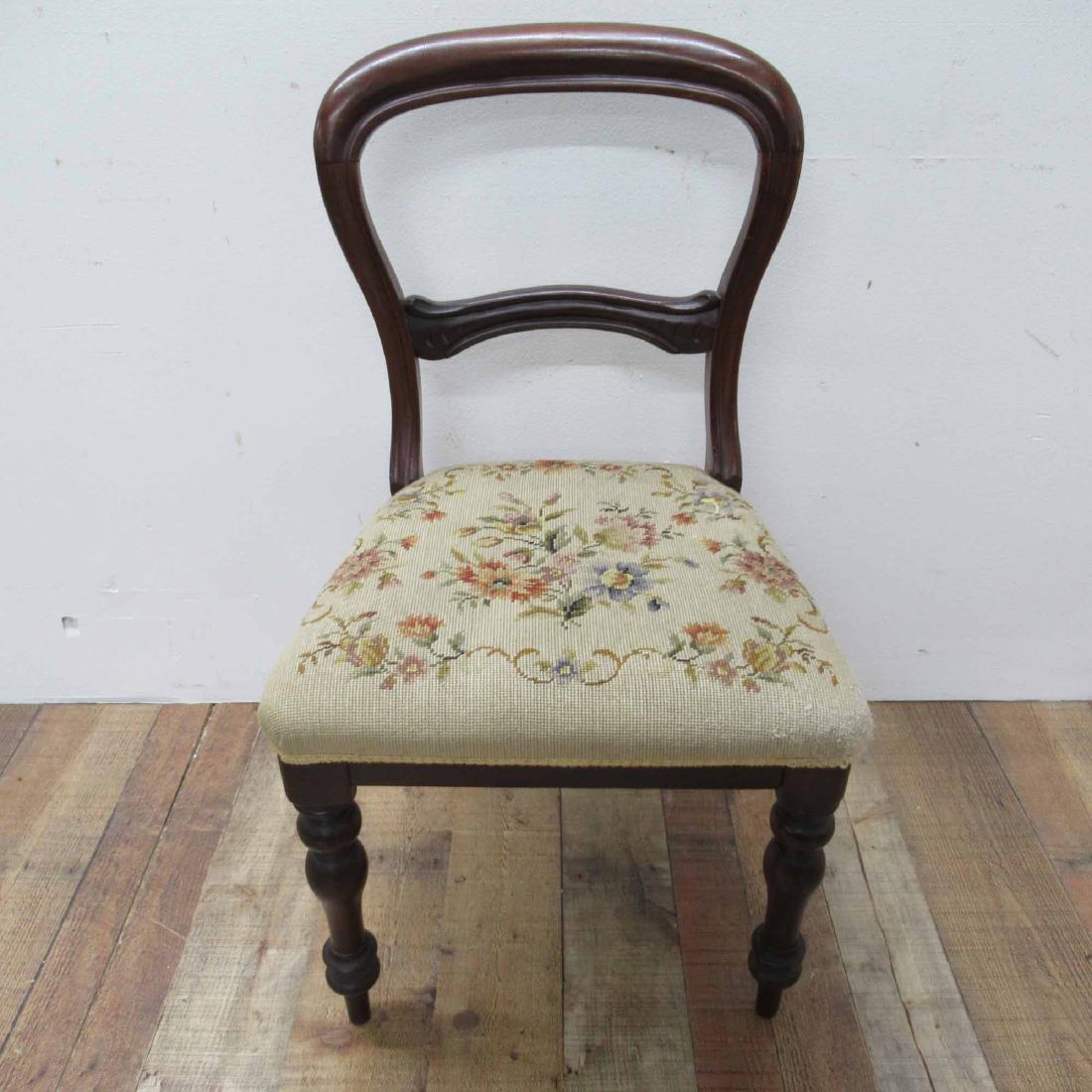 VICTORIAN MAHOGANY SIDE CHAIR: With needlepoint seat. 34"h
