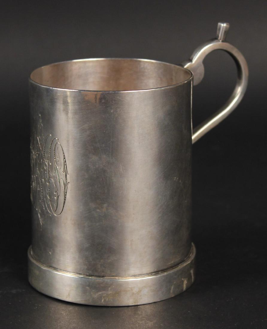 UNMARKED SILVER HANDLED CANN: With elaborate monogram, and provenance as having belonged to Jonathan Oaks, Shipmaster, weight approx. 13 T.O. 4-1/4"h