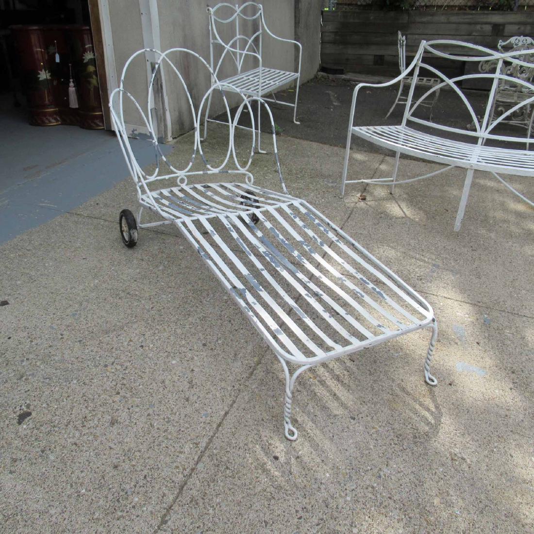 RIBBON BACK METAL CHAISE LOUNGE CHAIR: With metal strapping. 72" l x 30" x 34" tall